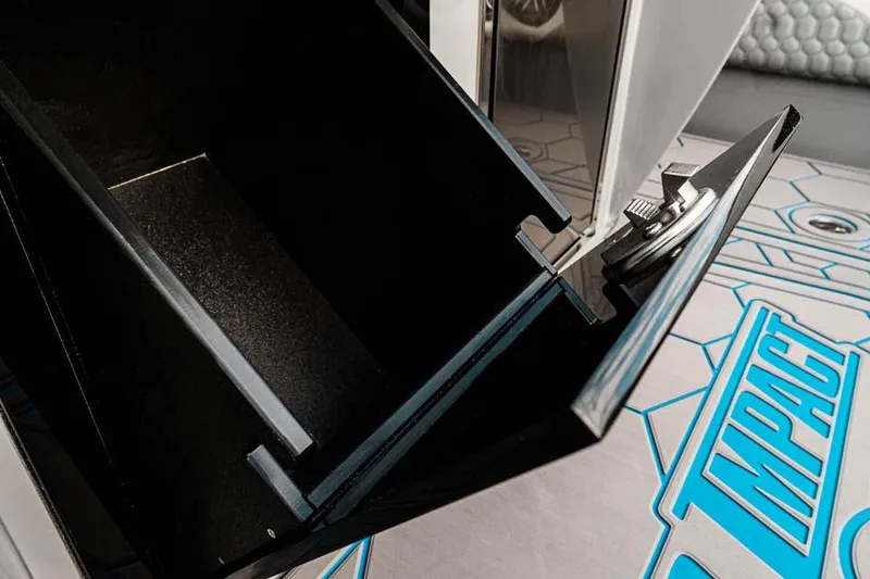 Slide: The Image of Open storage compartment on 2027 Deep Impact 399 Fwd Cabin boat, showcasing interior details. - 10