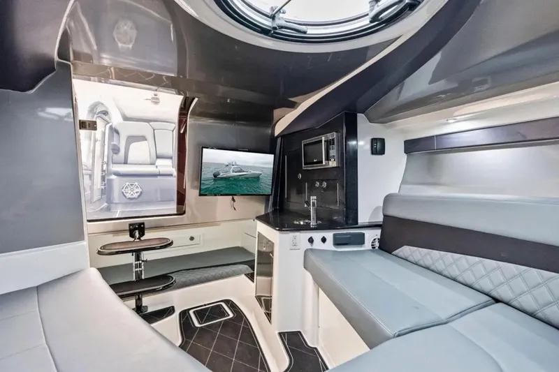 Slide: The Image of Luxurious interior of 2027 Deep Impact 399 Fwd Cabin boat with modern amenities. - 12