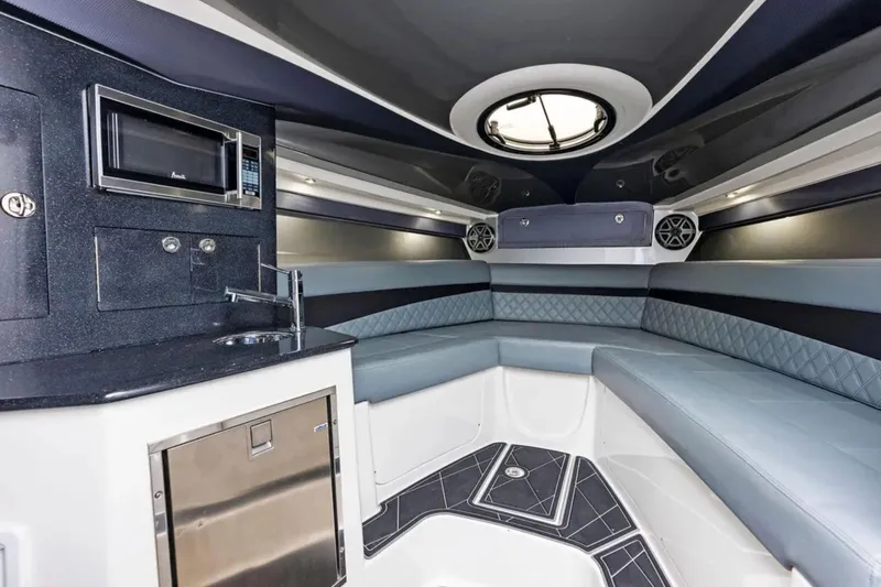 Slide: The Image of Luxurious interior of 2027 Deep Impact 399 Fwd Cabin with modern amenities and seating. - 13