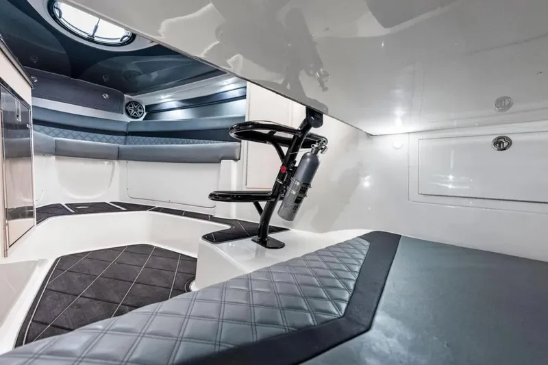 Slide: The Image of Luxurious interior of 2027 Deep Impact 399 Fwd Cabin boat, featuring modern seating and sleek design. - 15