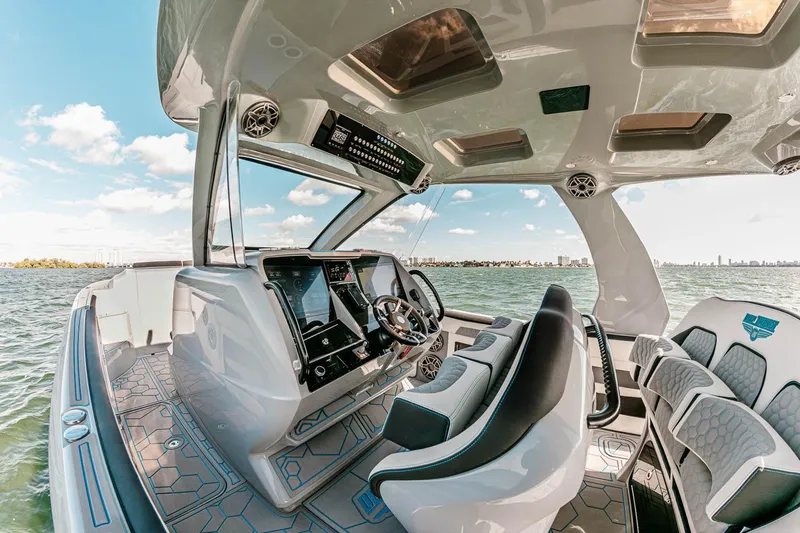 Slide: The Image of Luxurious 2027 Deep Impact 399 Fwd Cabin boat interior with advanced navigation system. - 7
