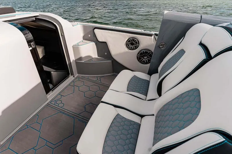 Slide: The Image of 2027 Deep Impact 399 Fwd Cabin interior with stylish seating and modern design. - 9
