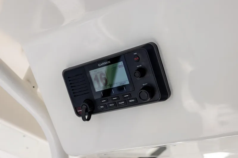 Slide: The Image of Garmin marine radio on 2021 Regulator 31 boat dashboard. - 46