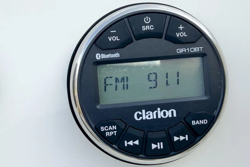 Slide: The Image of Clarion GR10BT radio displaying FM 91.1 on a 2021 Key West 189 FS boat. - 12