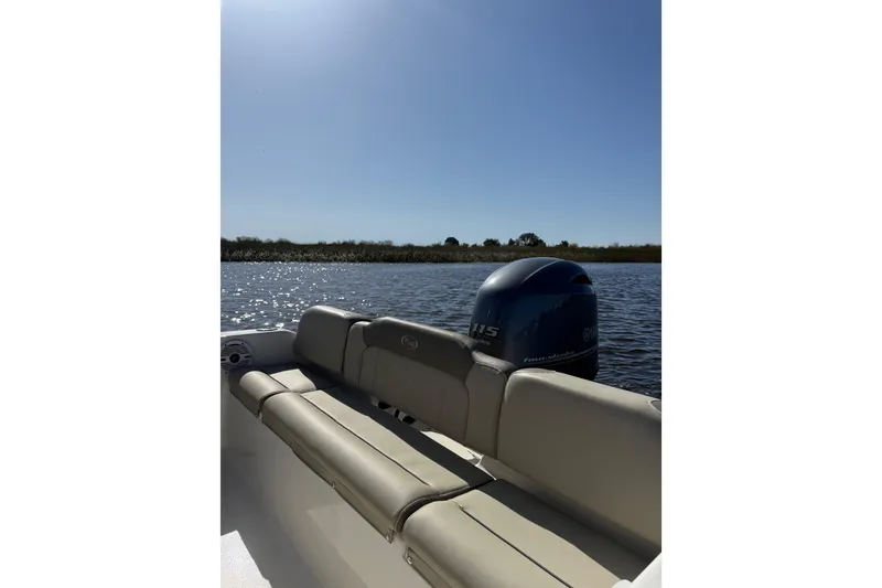 Slide: The Image of 2021 Key West 189 FS boat on calm water under clear blue sky. - 16