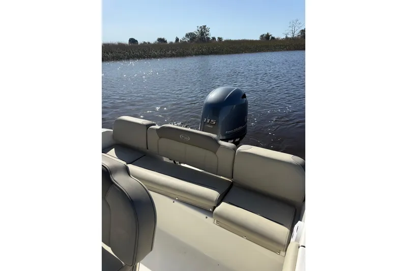 Slide: The Image of 2021 Key West 189 FS boat with Yamaha 115 engine on calm water. - 5