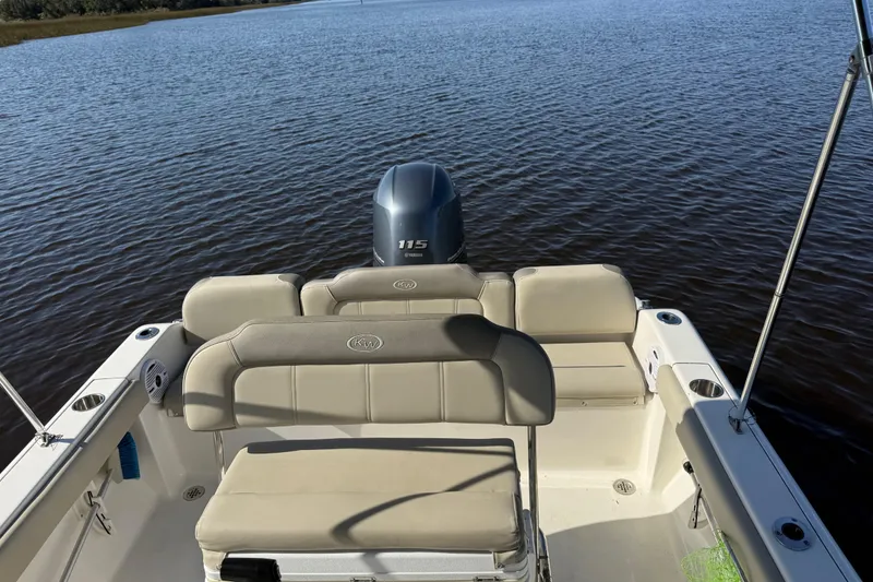 Slide: The Image of 2021 Key West 189 FS boat with Yamaha 115 engine on calm water. - 6