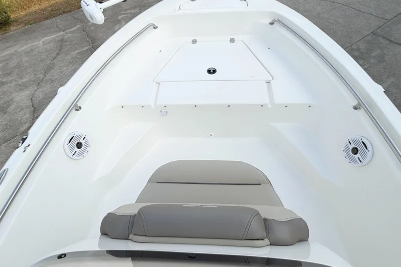 Slide: The Image of 2021 Key West 189 FS boat interior with seating and speakers. - 9