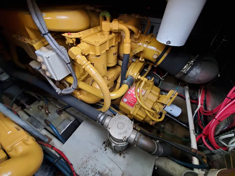 Slide: The Image of Engine room of a 1993 Giorgi 46, featuring complex machinery and wiring. - 39