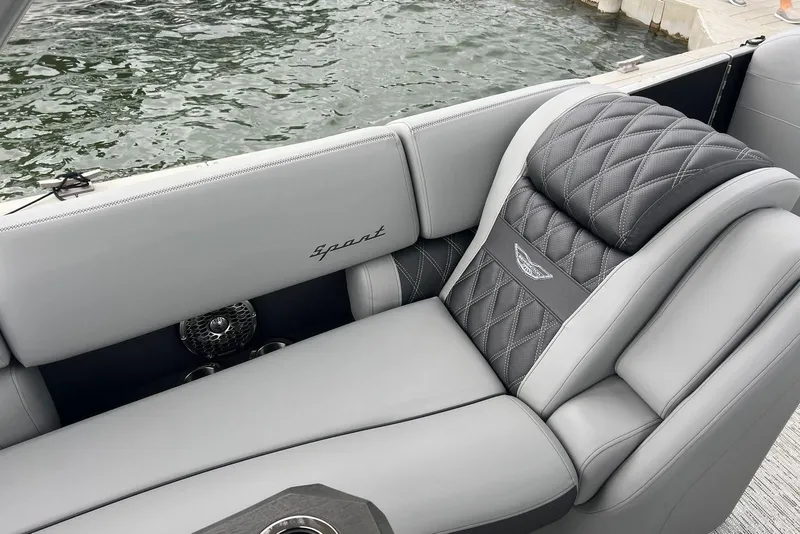 Slide: The Image of Luxurious seating on 2026 Bennington RX 25 RXFBA boat, featuring elegant quilted upholstery. - 5