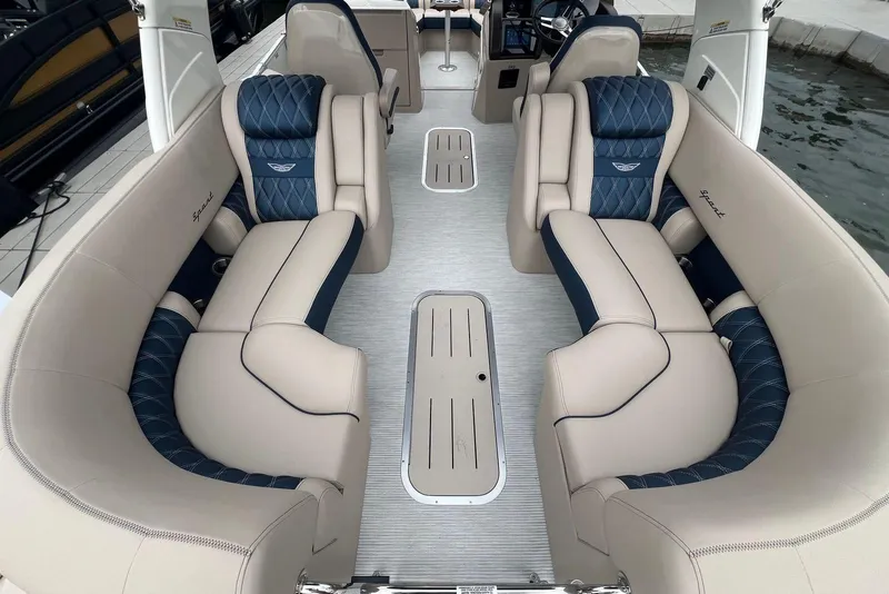 Slide: The Image of Luxurious interior of 2026 Bennington 25 RTFBA boat with plush seating and elegant design. - 7