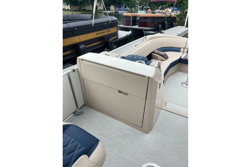 Slide: The Image of 2026 Bennington 25 RTFBA pontoon boat with luxurious seating and sleek design. - 8