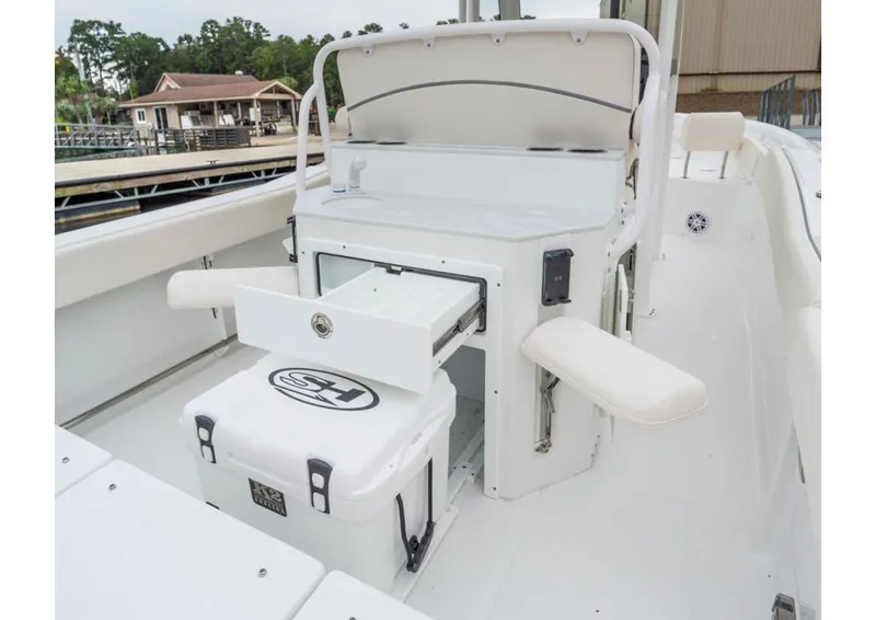 Slide: The Image of Manufacturer Provided Image: 2026 Sea Hunt Ultra 245 SE boat interior with storage and seating features. - 4