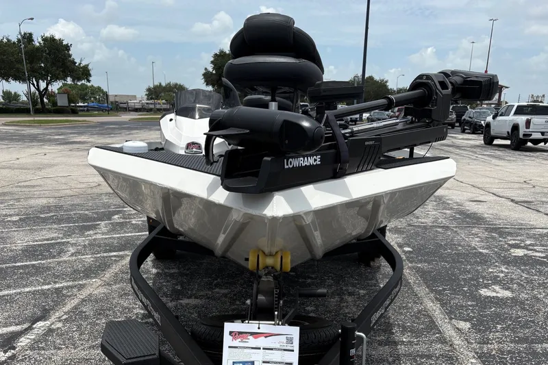 Slide: The Image of 2026 Ranger RT188C boat on trailer in parking lot, featuring Lowrance equipment. - 1