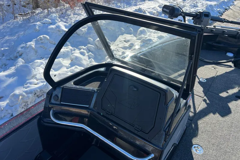 Slide: The Image of 2026 Nitro ZV20 boat console with windshield, snowy background. - 9