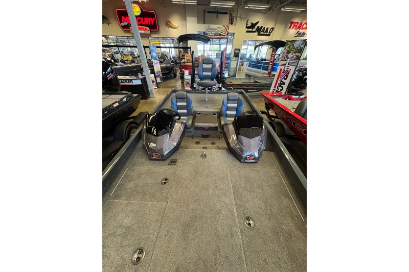 Slide: The Image of 2026 Ranger RT198P boat interior in showroom, featuring dual seats and modern design. - 10