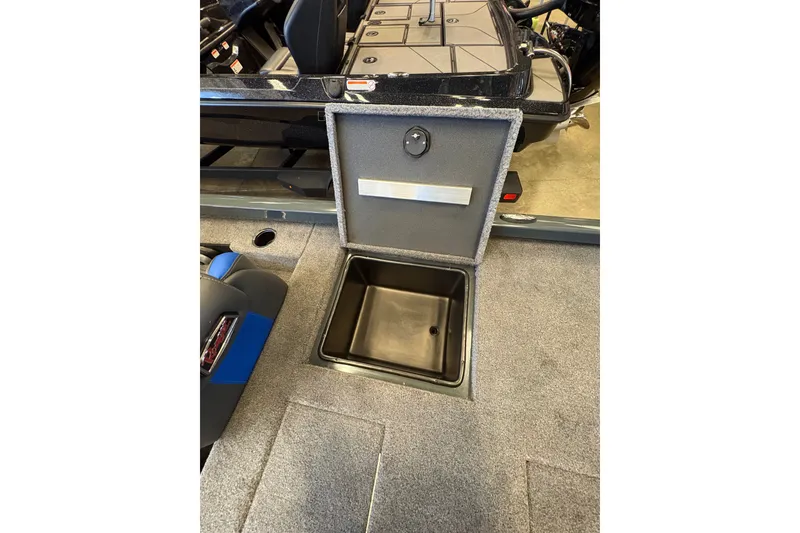 Slide: The Image of Open storage compartment in 2026 Ranger RT198P boat interior. - 17