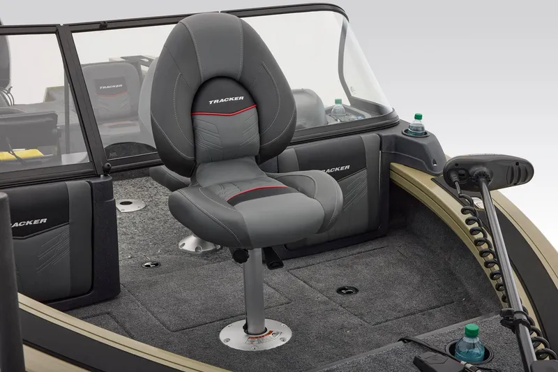 Slide: The Image of 2026 Tracker Targa V-18 Combo boat interior with gray carpet and seating. - 26