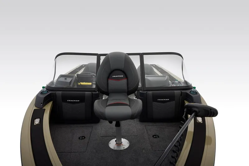 Slide: The Image of 2026 Tracker Targa V-18 Combo boat interior with gray seating and storage compartments. - 27