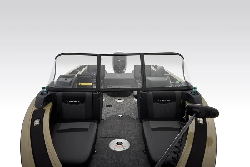 Slide: The Image of 2026 Tracker Targa V-18 Combo boat interior with storage compartments and seating. - 30
