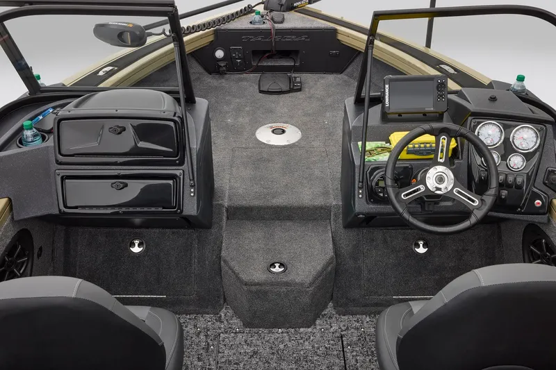 Slide: The Image of Storage compartment in 2026 Tracker Targa V-18 Combo boat with battery and tools. - 31