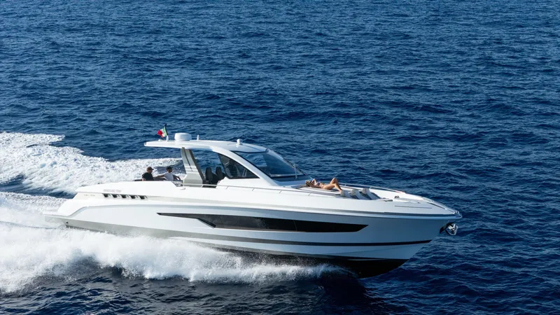 The Image of 2025 Canados 571 yacht cruising on open sea, sleek design, luxury vessel. - 0
