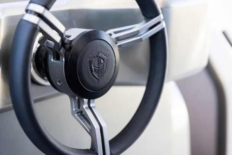 Slide: The Image of Steering wheel of 2025 Canados 571 yacht, featuring sleek design and modern craftsmanship. - 11