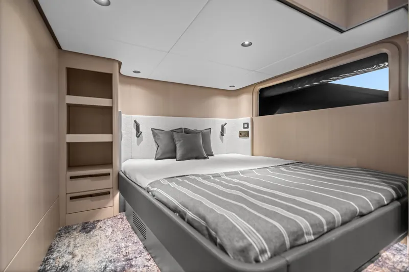 Slide: The Image of Luxurious bedroom interior of 2025 Canados 571 yacht with modern design and cozy bedding. - 17