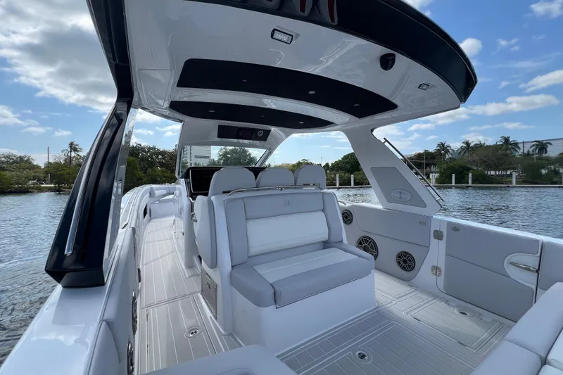 Slide: The Image of 2025 Cigarette 41 Nighthawk boat interior with sleek seating and modern design. - 21