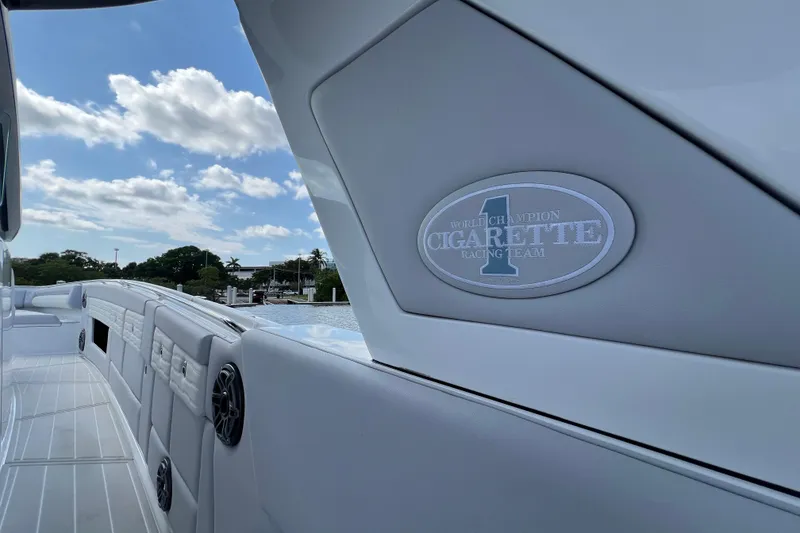 Slide: The Image of 2025 Cigarette 41 Nighthawk boat interior with logo, showcasing luxury design. - 40