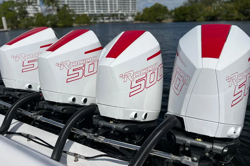 Slide: The Image of Four powerful Racing 500 outboard engines on a 2025 Cigarette 41 Nighthawk boat. - 45