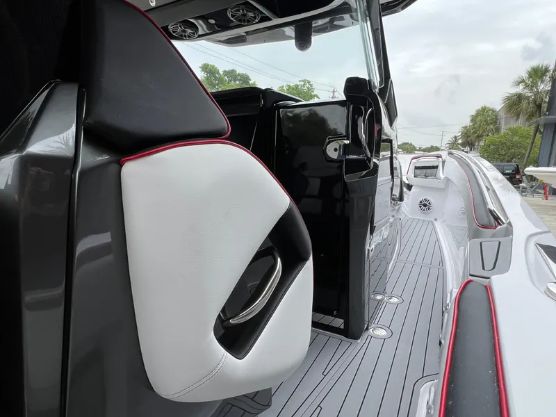 Slide: The Image of 2025 Nor-Tech 400 Supersport boat interior with sleek seating and modern design. - 19