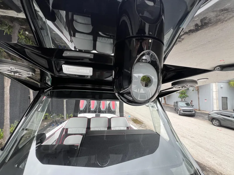 Slide: The Image of 2025 Nor-Tech 400 Supersport interior with sleek black design and modern features. - 25