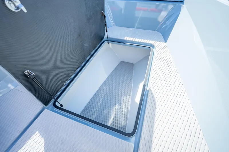 Slide: The Image of Storage compartment of the 2024 Goldfish 28 Tender boat. - 25