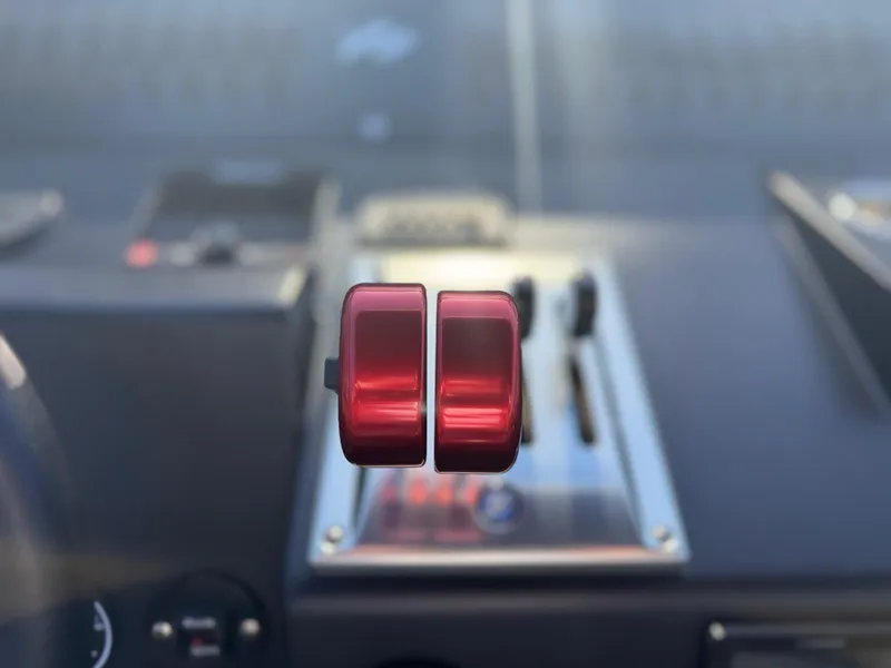 Slide: The Image of Close-up of 2024 Goldfish 46 Open boat throttle controls. - 21