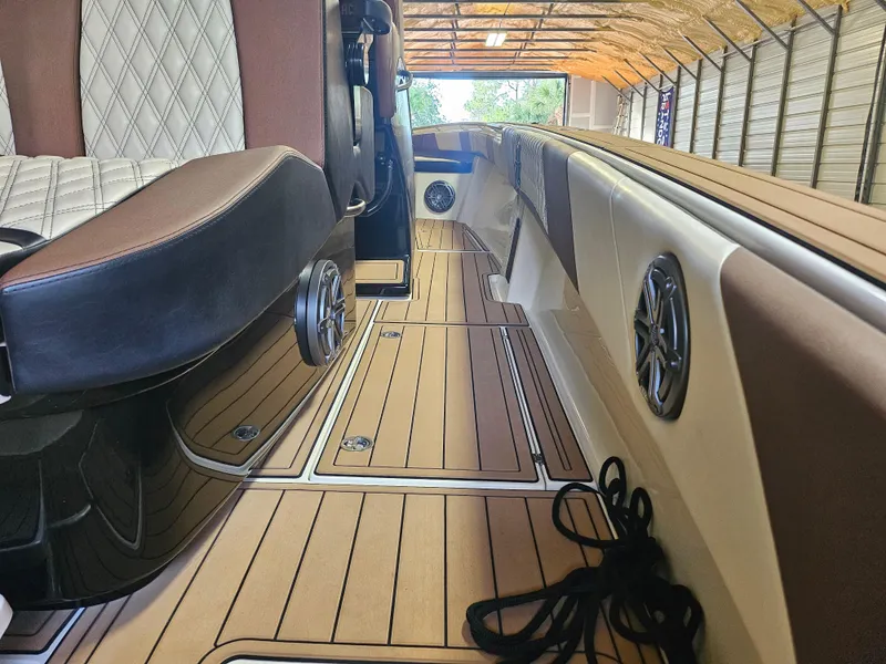 Slide: The Image of Luxurious interior of 2021 Statement 350 Open boat with elegant seating and wood flooring. - 12