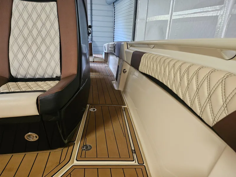 Slide: The Image of Luxurious interior of 2021 Statement 350 Open boat with diamond-stitched seating and teak flooring. - 16