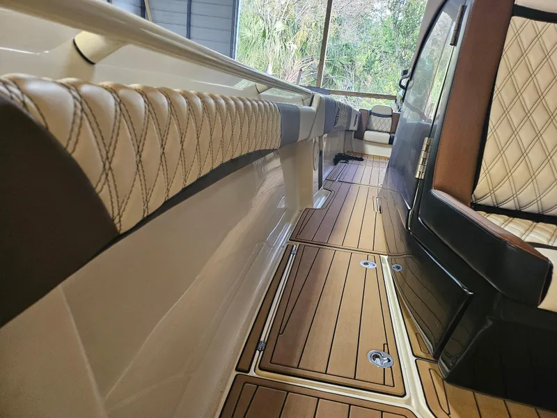 Slide: The Image of Luxurious interior of 2021 Statement 350 Open boat with elegant seating and wood flooring. - 17
