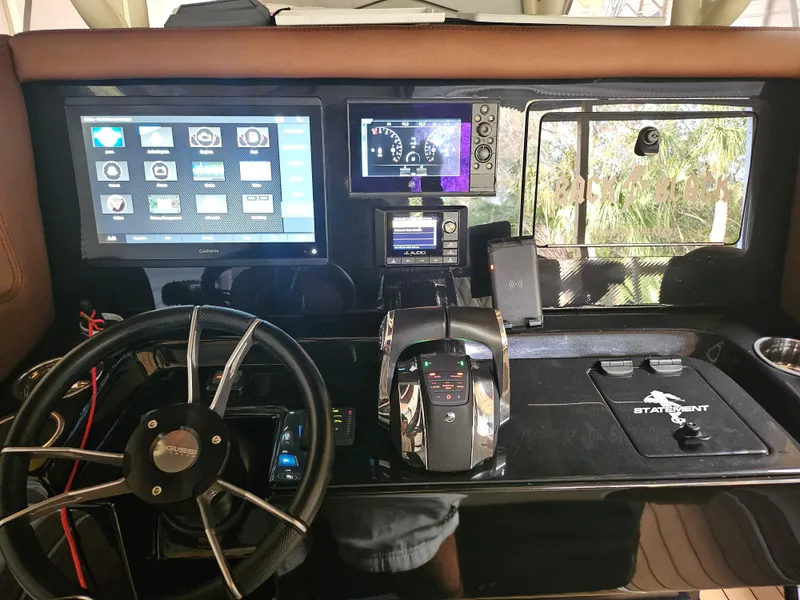 Slide: The Image of Control panel of 2021 Statement 350 Open boat with advanced navigation systems. - 25