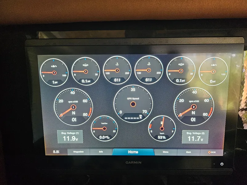 Slide: The Image of Dashboard display of a 2021 Statement 350 Open, showing various gauges and engine voltages. - 27