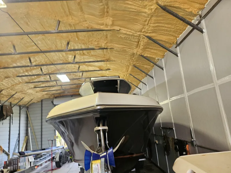 Slide: The Image of 2021 Statement 350 Open boat in a storage facility. - 37