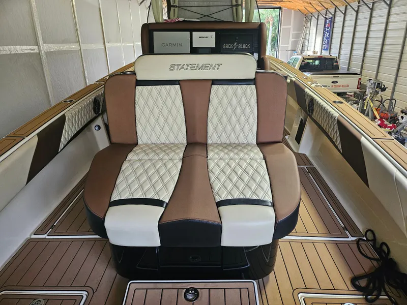 Slide: The Image of Luxury seating on 2021 Statement 350 Open boat, featuring elegant design and premium materials. - 4