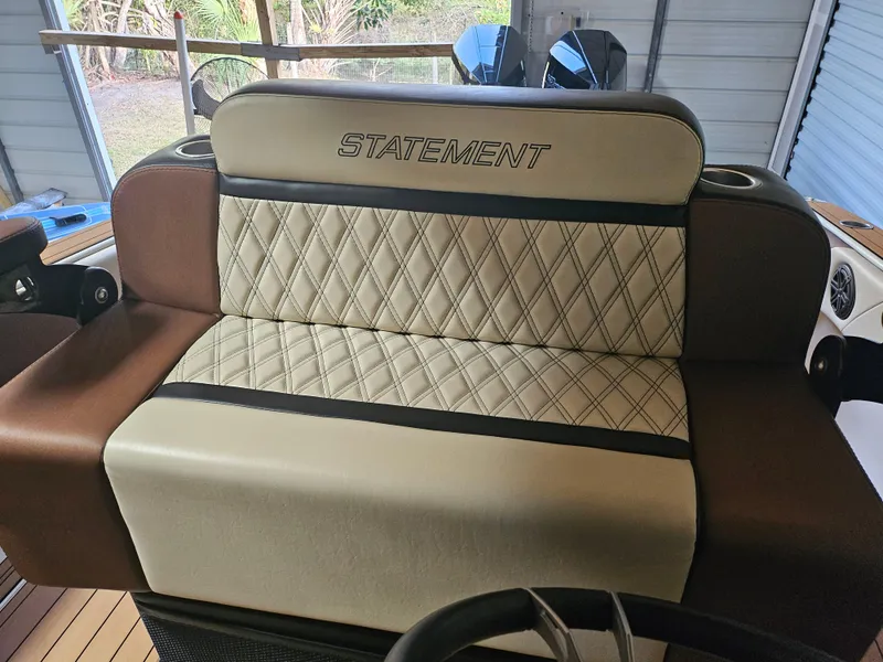 Slide: The Image of Luxurious seating on 2021 Statement 350 Open boat with diamond-pattern upholstery. - 8