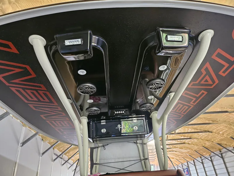 Slide: The Image of 2021 Statement 350 Open boat interior with speakers and electronic controls. - 9