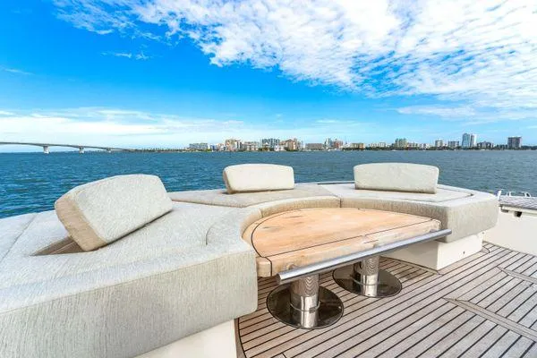 Slide: The Image of Luxurious 2018 Monte Carlo Yachts MCY 70 deck with scenic waterfront view. - 20