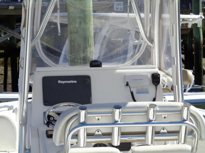 Slide: The Image of 2014 Sportsman Heritage 251 Center Console boat dashboard with Raymarine equipment. - 3