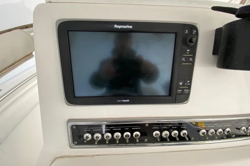 Slide: The Image of Control panel of 2014 Sportsman Heritage 251 Center Console with Raymarine display. - 7