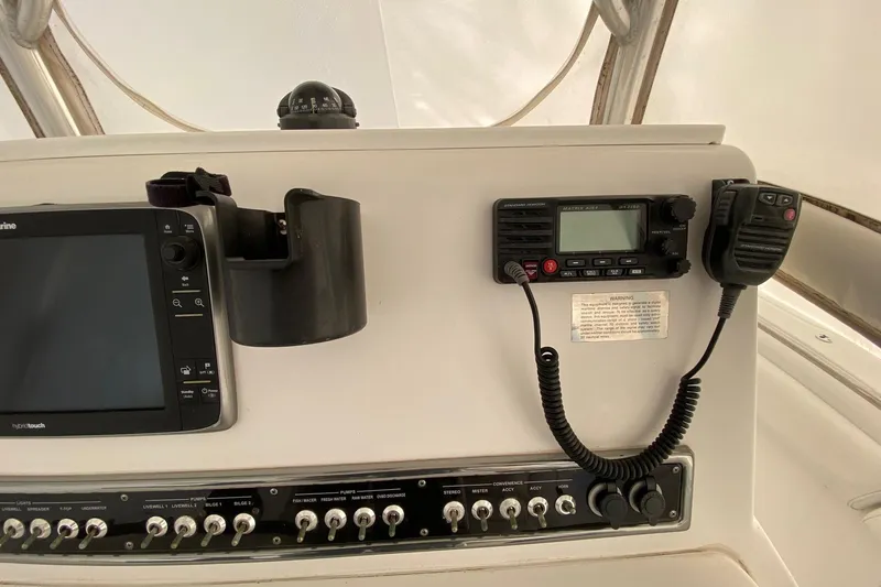 Slide: The Image of Control panel of 2014 Sportsman Heritage 251 Center Console with navigation and communication equipment. - 8