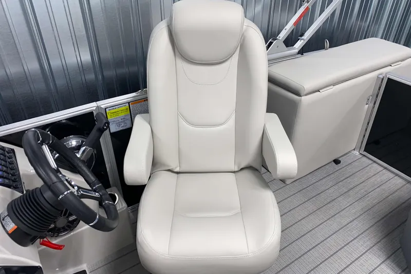 Slide: The Image of Control panel of 2026 Sylvan Mirage 8520 CLZ DH PTS Tritoon with switches and cup holder. - 10