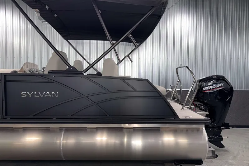 Slide: The Image of 2026 Sylvan Mirage 8520 CLZ DH PTS Tritoon with Mercury engine in showroom. - 22